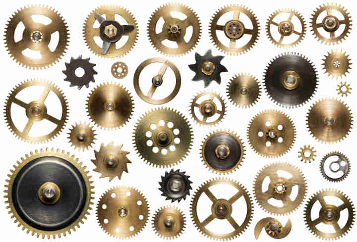 Clockwork spare parts. Metal gear, cogwheels and other details.